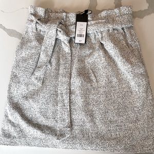 New Dynamite skirt in black and cream mix. Size small